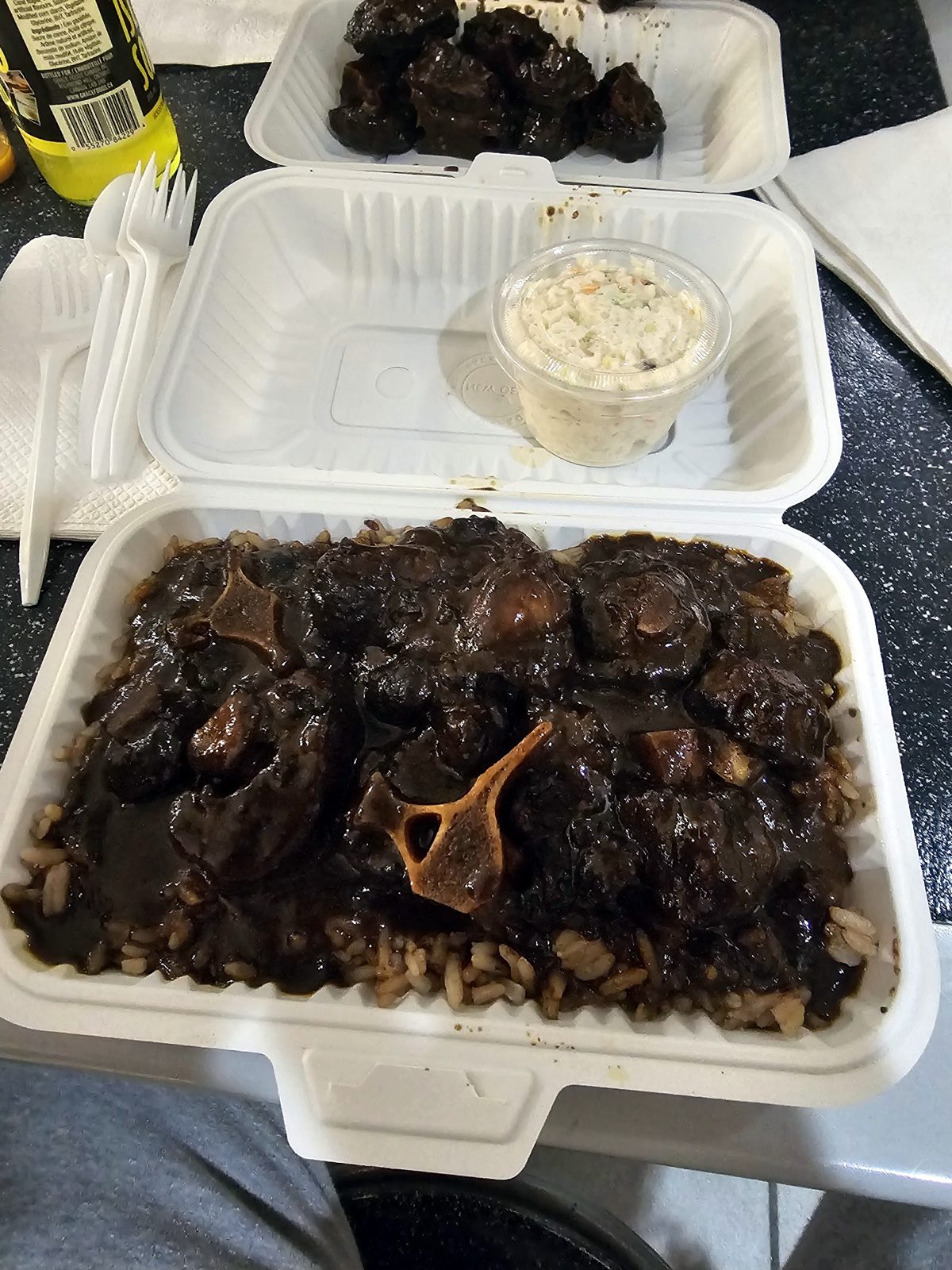 Oxtail on rice and peas